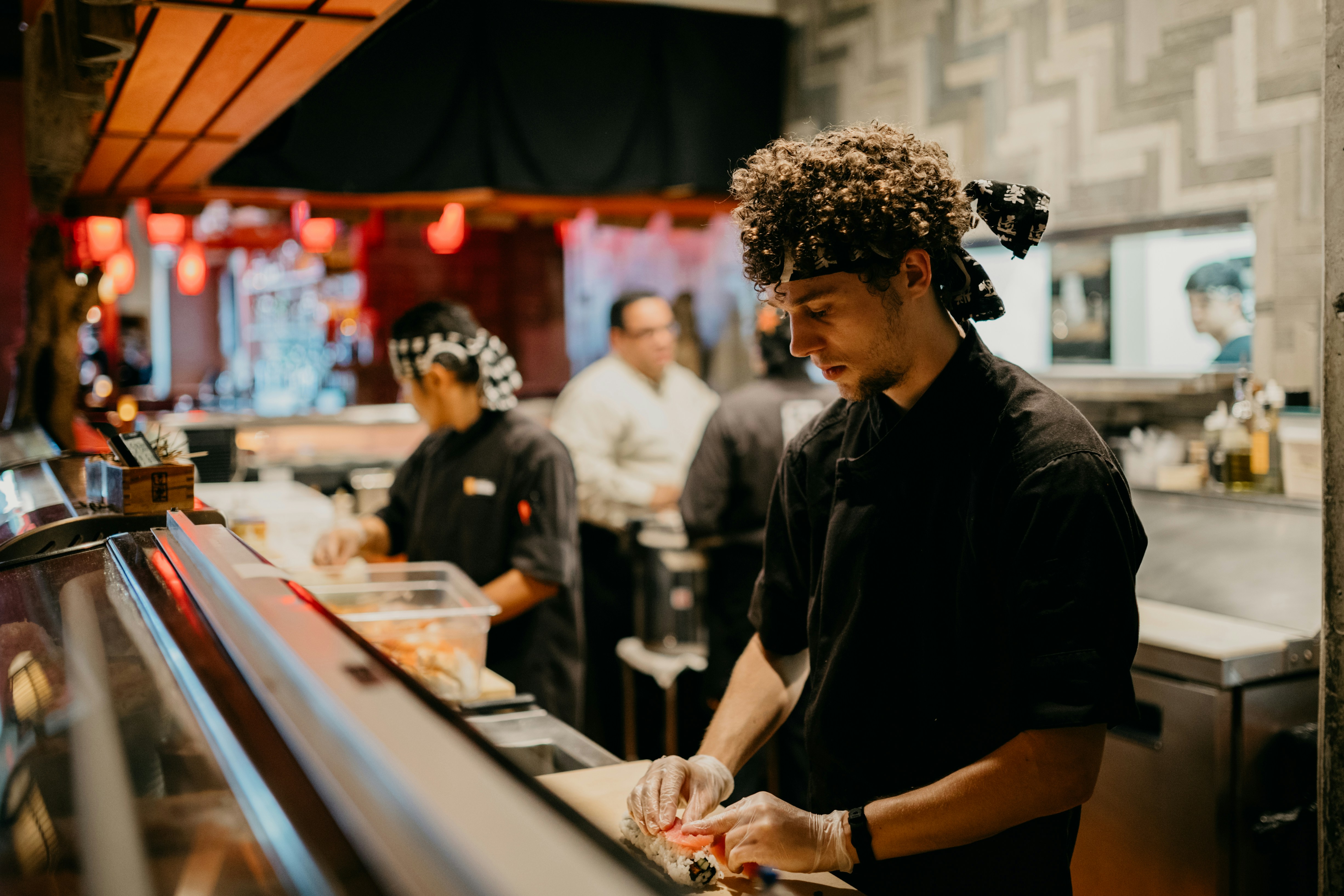 Professional chefs working in modern restaurant kitchen in Arlington Virginia
